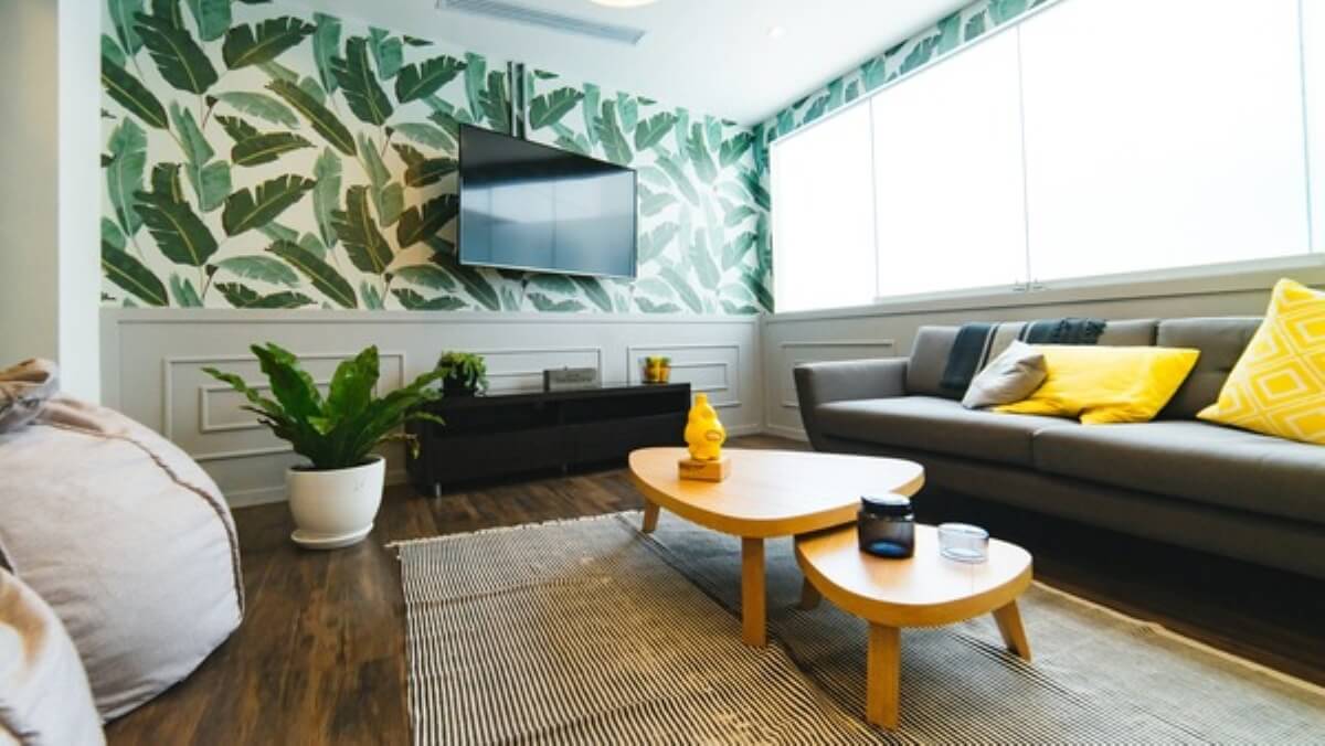 Newly renovated living room with modern furniture, showing the potential results of home renovation loans.