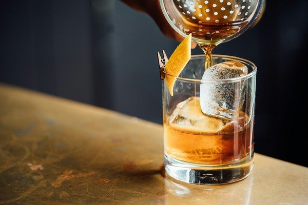 Pouring alcohol in a glass