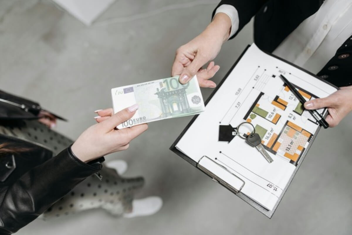 Buyer making a property payment during the process of buying property in Malaysia.