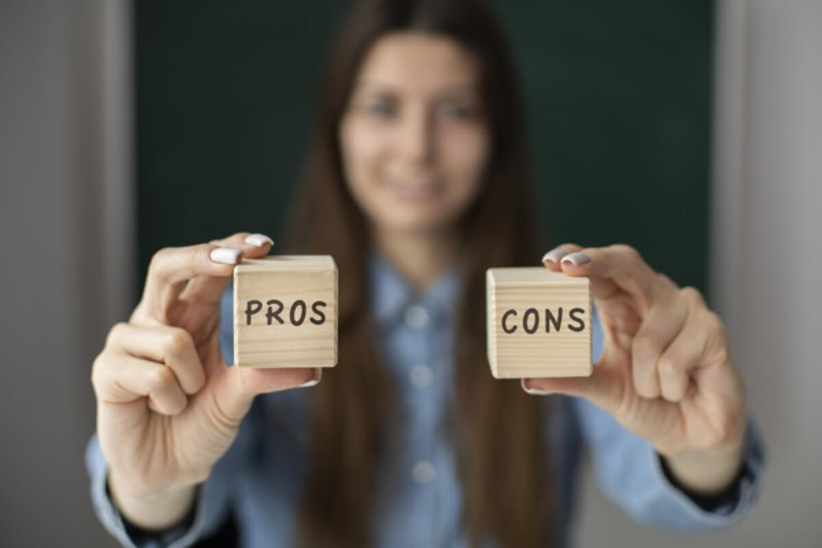 Person weighing the pros and cons before accepting contract jobs or freelance opportunities.