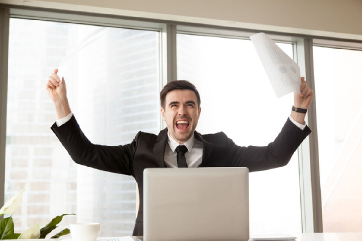 Professional celebrating a successful project milestone while building a career in contract jobs.