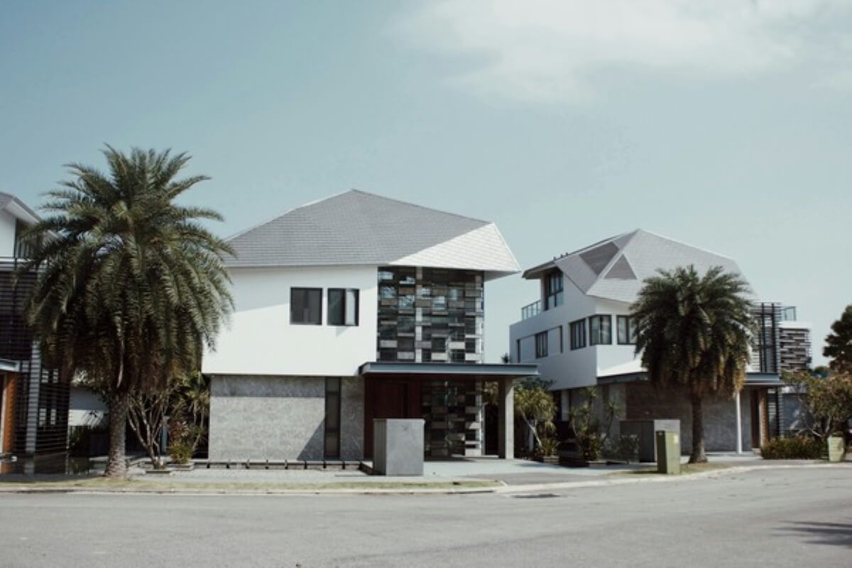 Landed homes in a residential neighbourhood, highlighting how mortgage loan insurance can protect outstanding home financing.