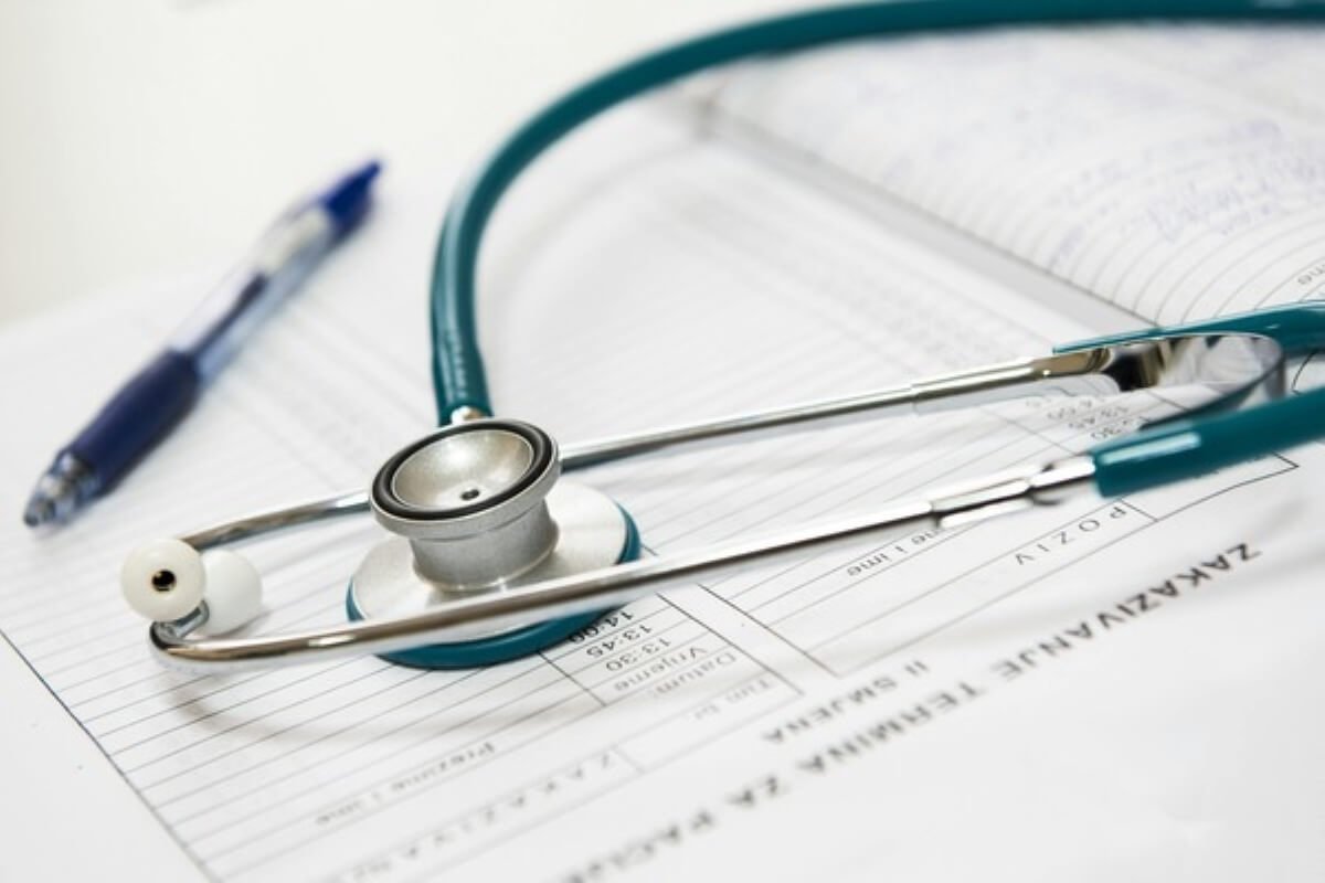 Stethoscope resting on medical forms, symbolising MediShield Life changes and hospital insurance coverage.