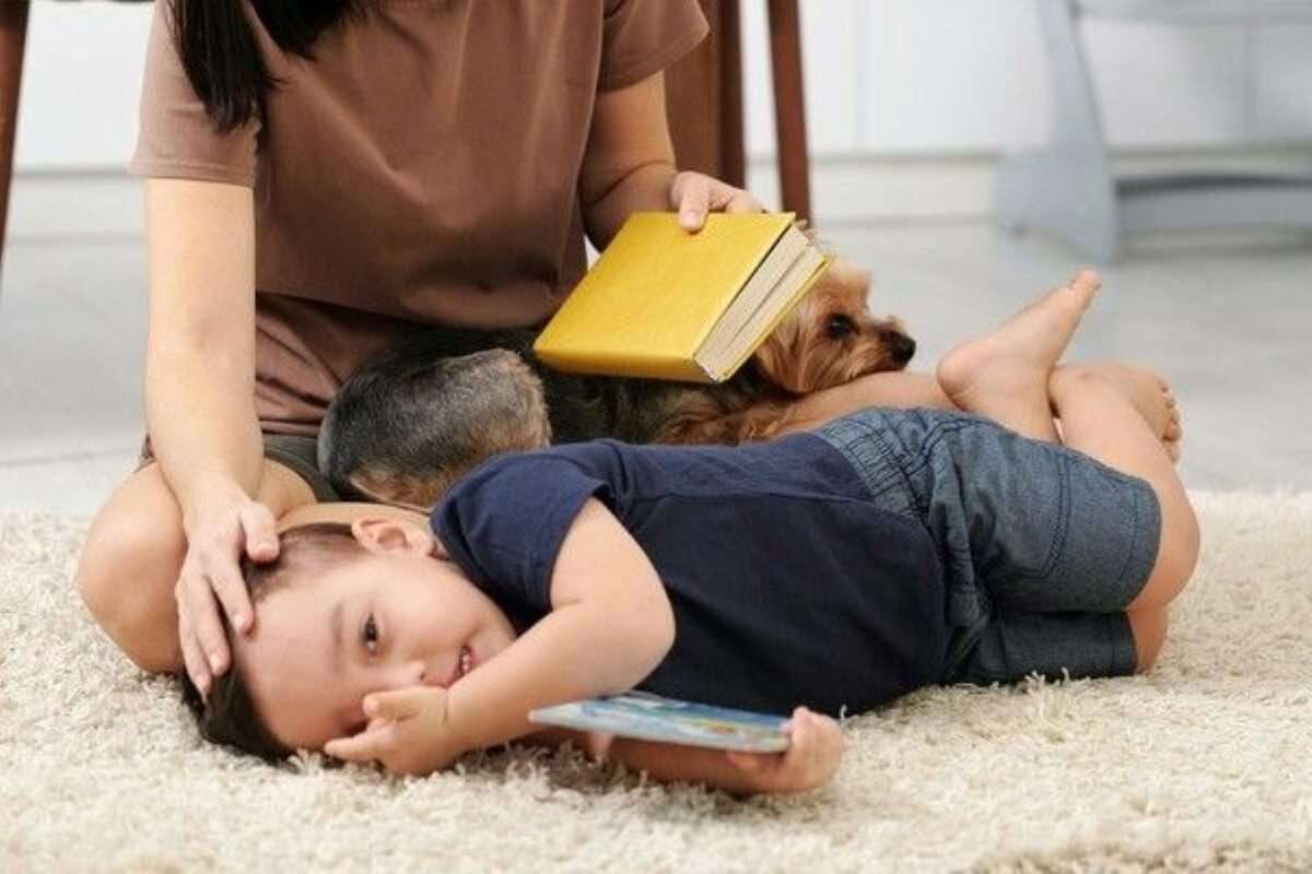 Parent comforting a child at home, showing how early financial guidance can help make your child a millionaire.