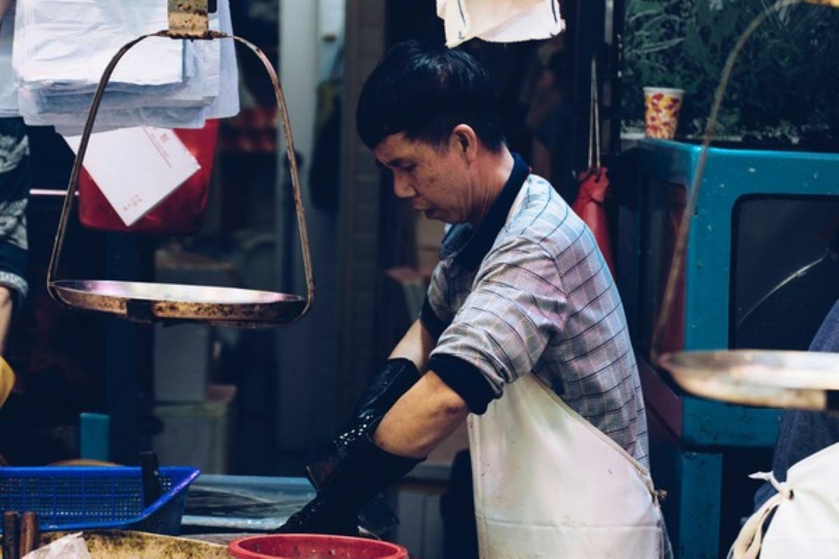 Older worker continuing manual labour, reflecting retirement adequacy concerns after cpf changes 2025.