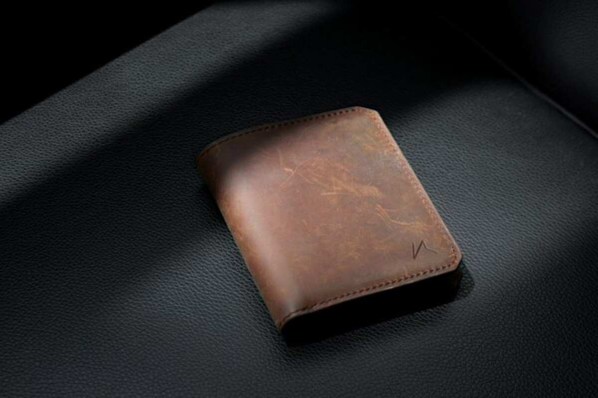 Simple leather wallet highlighting minimalist money management and mindful spending.