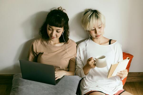 A photo of two women sitting together