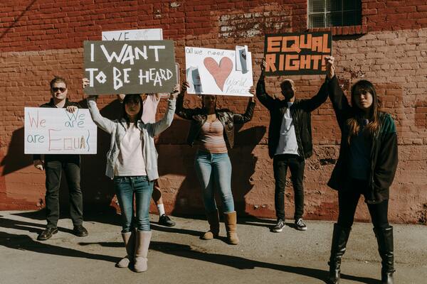 A photo of a group of black people rallying about freedom