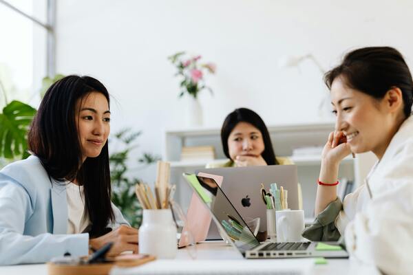 A photo of a group of people working together