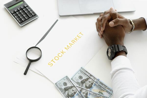 A photo of a document with the text saying stock market