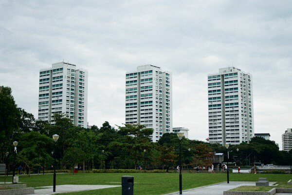Three tall buildings standing side by side