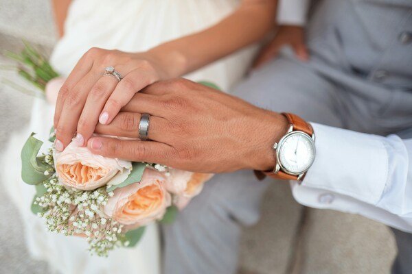Man and woman holding hands