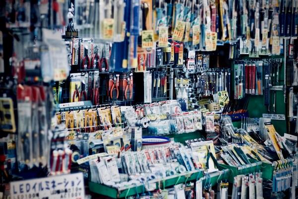 Hardware store displaying tools and home improvement supplies, highlighting practical things to buy with CDC vouchers beyond groceries.