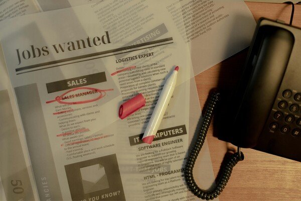 Job opening marked in newspaper