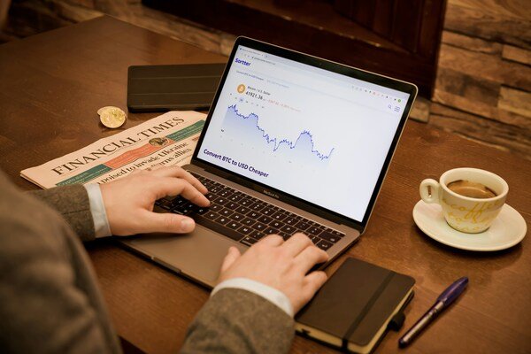 Person typing on a laptop at a table