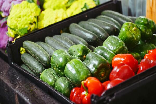 Bell peppers and zucchinis in a tray