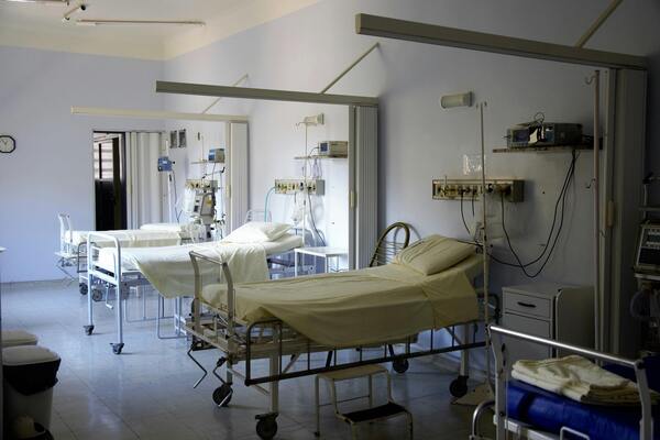 White hospital beds in hospital