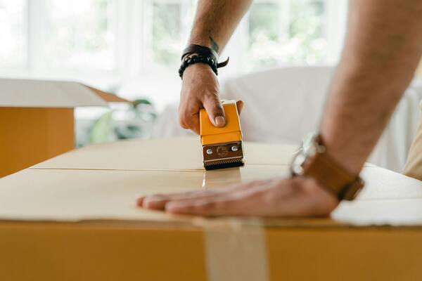 Packing cardboard boxes for moving houses