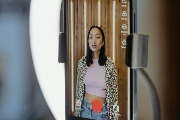 Woman doing a video on her phone
