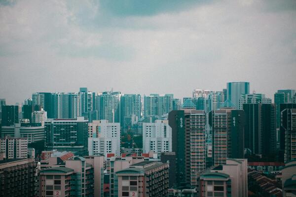 City skyline with high-rise residential buildings, representing urban property, real estate investment, and housing markets.